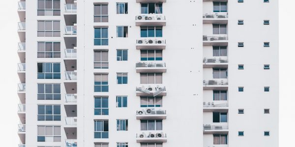minimalist photography of white and gray condominium